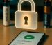 A glowing padlock over a smartphone, symbolizing secure online shopping and data protection in Australia.